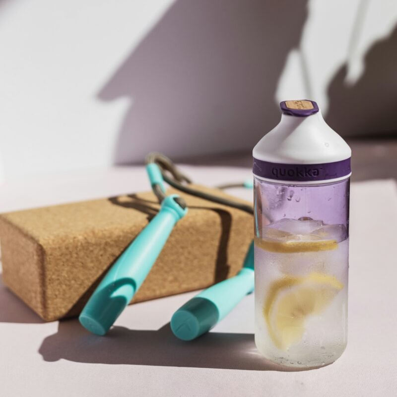 white and blue plastic bottle